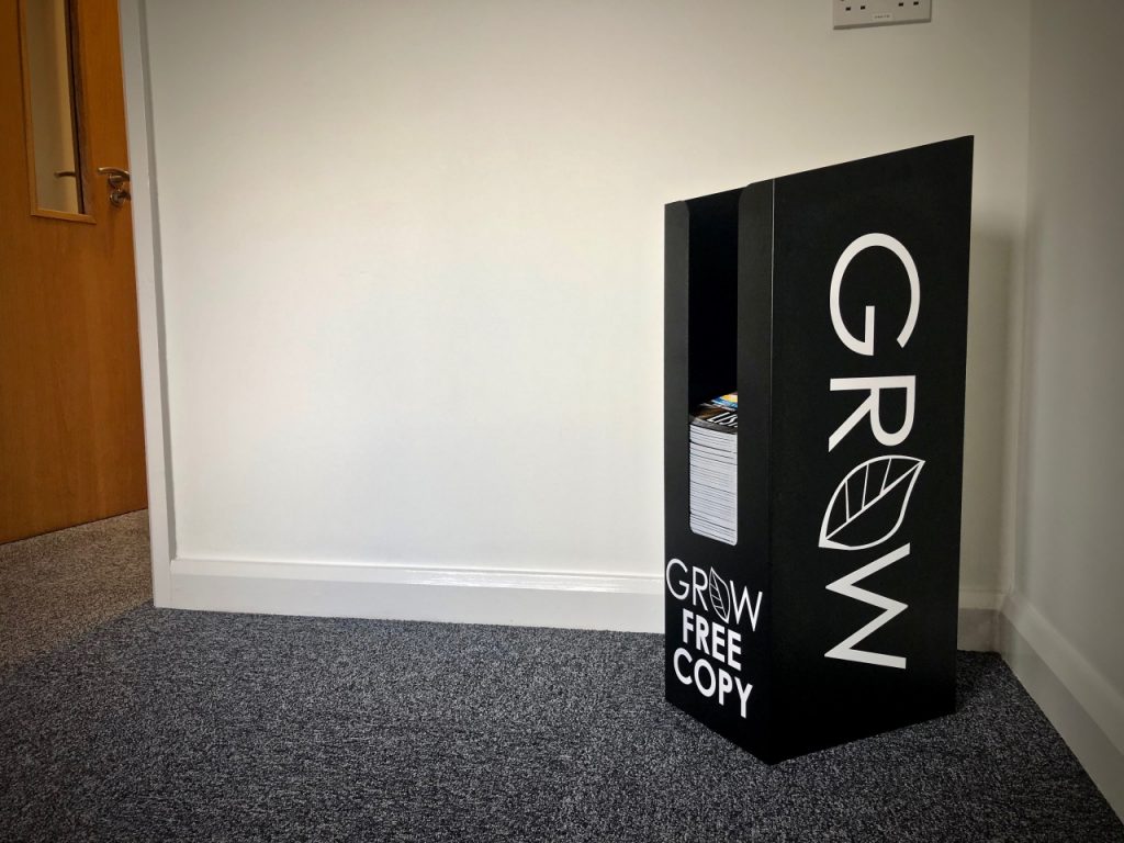 grab a grow magazine from black custom bulk bins