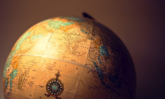 The Best of Both Worlds: A Local Adviser with a Global Support Network